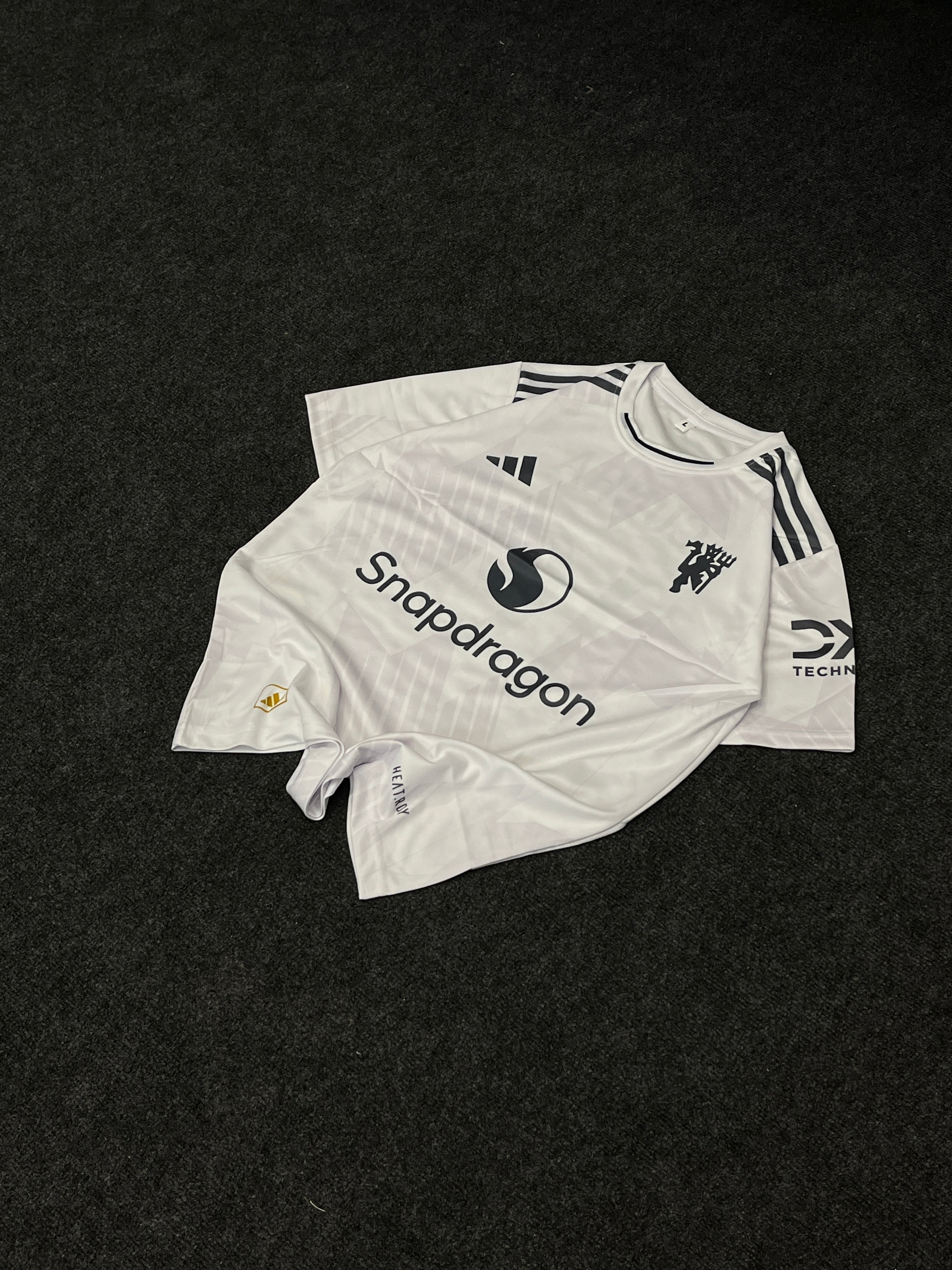 MANCHESTER UNITED AWAY JERSEY CUHNA